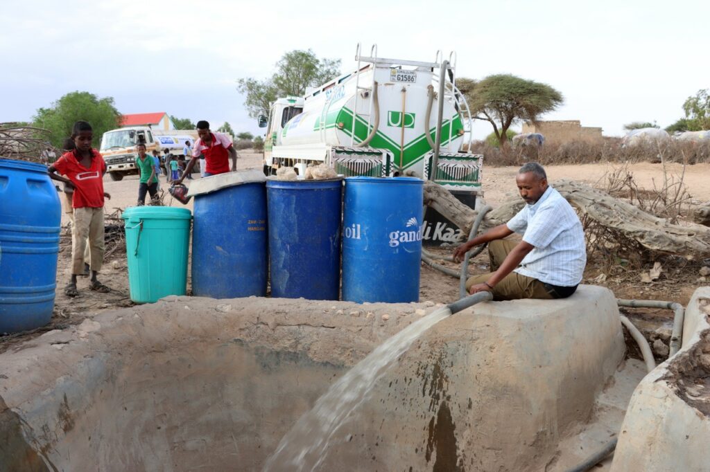 A water truck fills a cistern in Somaliland