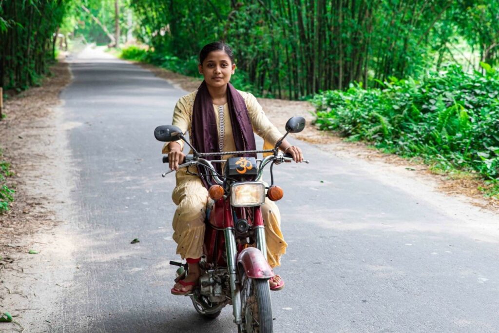 Antora on her motorbike