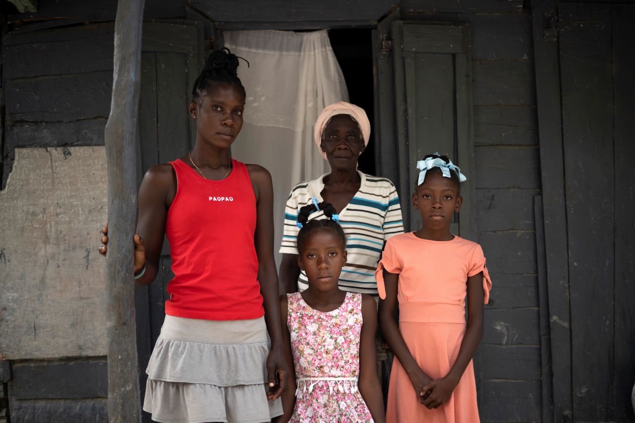 Chedeline (middle) and her family