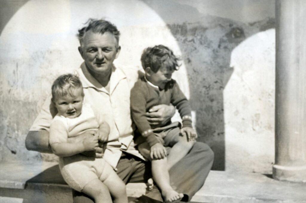 John Langdon Davies, Founder of Plan International, with two of his children.